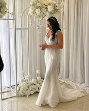 C2024-S812 - sleeveless beaded wedding gown with detachable overskirt