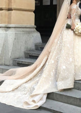 C2024-PSL993 - Plus size wedding ball gown with long sheer sleeves.