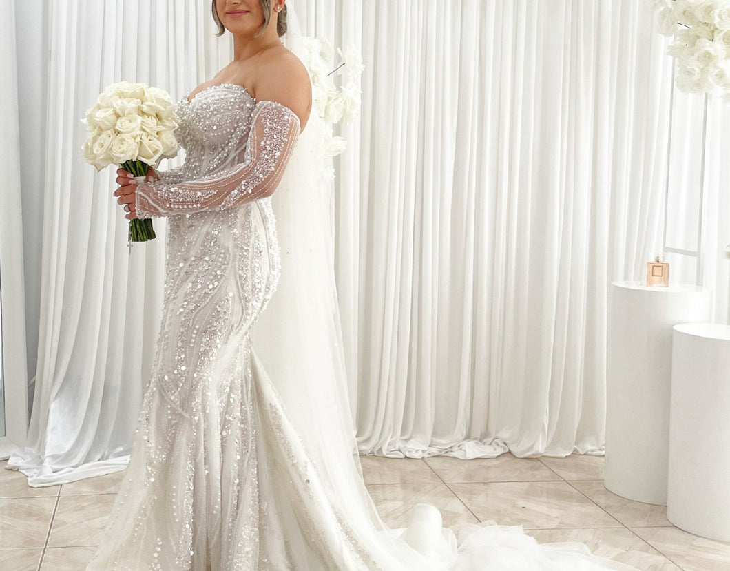 C2024-SLS659 - strapless beaded wedding gown with detachable sheer sleeves