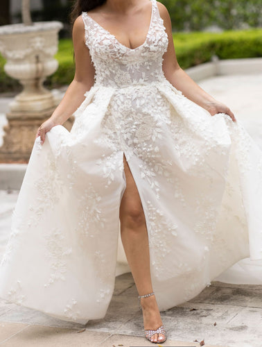 C2024-Leah46 - sleeveless v-neck wedding gown with slight empire waist line and 3D embellishments