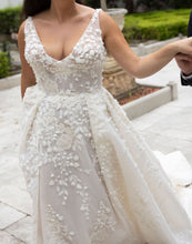 C2024-Leah46 - sleeveless v-neck wedding gown with slight empire waist line and 3D embellishments