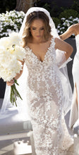 C2024-SK23 - fitted sleeveless wedding gown with v-bust line and beaded embroidery embellishments