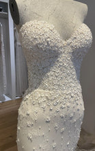 C2023-SBB4 - strapless fitted wedding gown with flowing over skirt