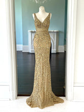 C44307 - Sleeveless gold beaded pageant gown dress with v-neck and empire waist line