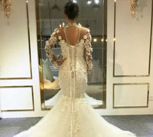 C2023-BLS419 - sheer long sleeve illusion neckline wedding dress with swarovski crystals