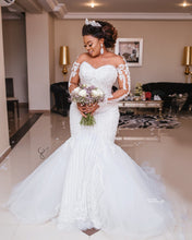 C2019-LSF19 - Sheer long sleeve fit-n-flare wedding gown for plus size bride with illusion neckline