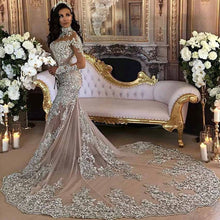 C2020 - BLS989 - swarovski crystal beaded long sleeve illusion neckline wedding gown with detachable over skirt train