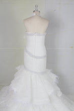 C2022-Vintea - halter fit-and-flare wedding gown with tiered ostrich feather train