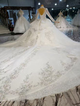 Style 820-23  Long sleeve bling wedding gown