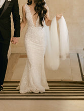 C2022-SV320 - robe de mariée transparente sans manches à motif floral et col en V