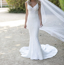 C2023-SS452b - fitted backless embroidered wedding gown with spaghetti straps