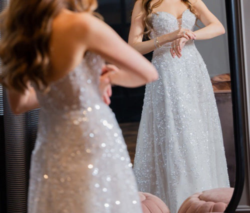 Vestido de novia evasé brillante sin tirantes 