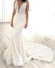 C2022-SV282  Sleeveless sexy v-neck beaded wedding gown