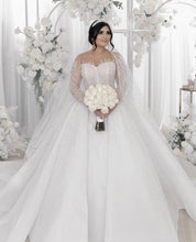 C2022-BB2T7 Sheer beaded long sleeve ball gown wedding dress