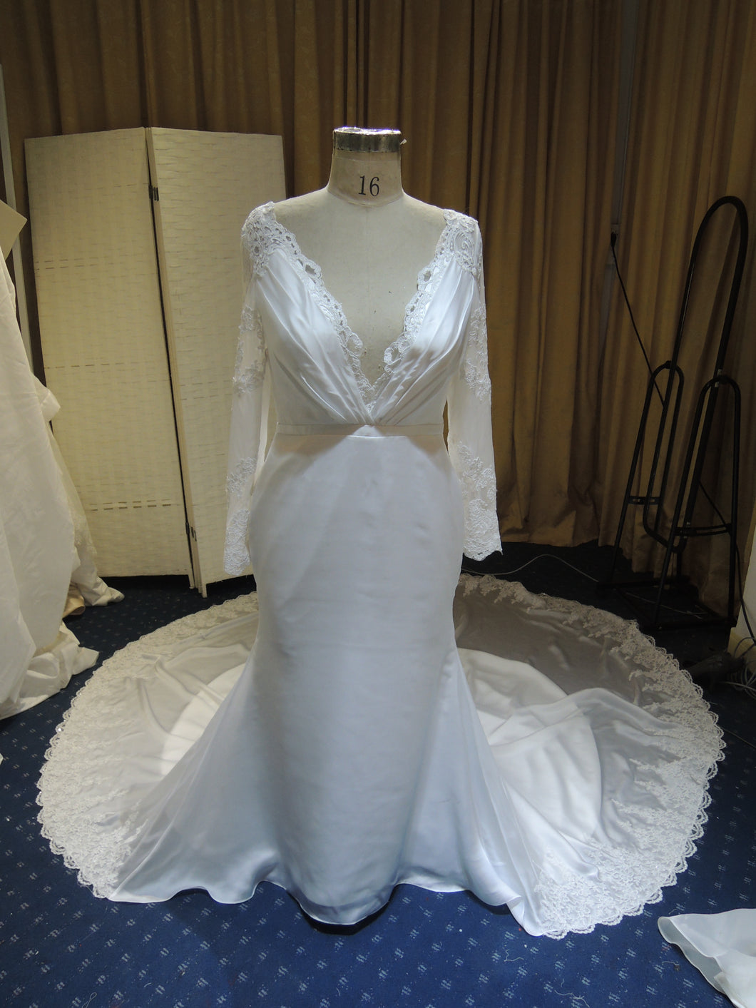 Replica of long sleeve v-neck wedding gown