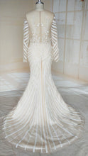 C2021-Jumoke - Elegant long sleeve illusion neck line wedding gown