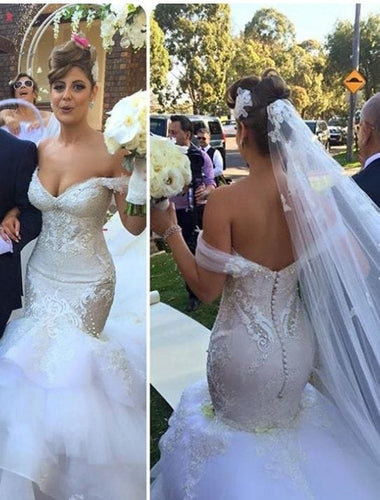 C2021OS31 - Vestido de novia ajustado y con vuelo y hombros descubiertos 