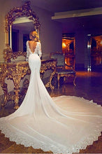 Replica of long sleeve v-neck wedding gown