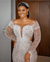 C2022-BB28 - Sheer long sleeve Crystal and Pearl beaded wedding gown