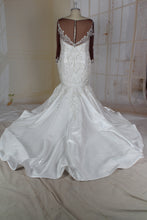 Sheer long sleeve plus size wedding gown for darker skin tone