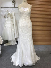 Style #791 - Beaded white wedding dress from Darius