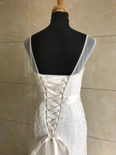 Style DOL-Y003 - Sleeveless illusion neckline wedding gown