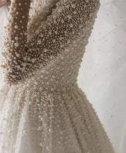 C2021-osP55 - Long sleeve one shoulder Pearl beaded wedding gown