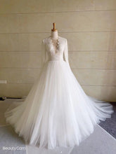 Sheer long sleeve a-line wedding gown