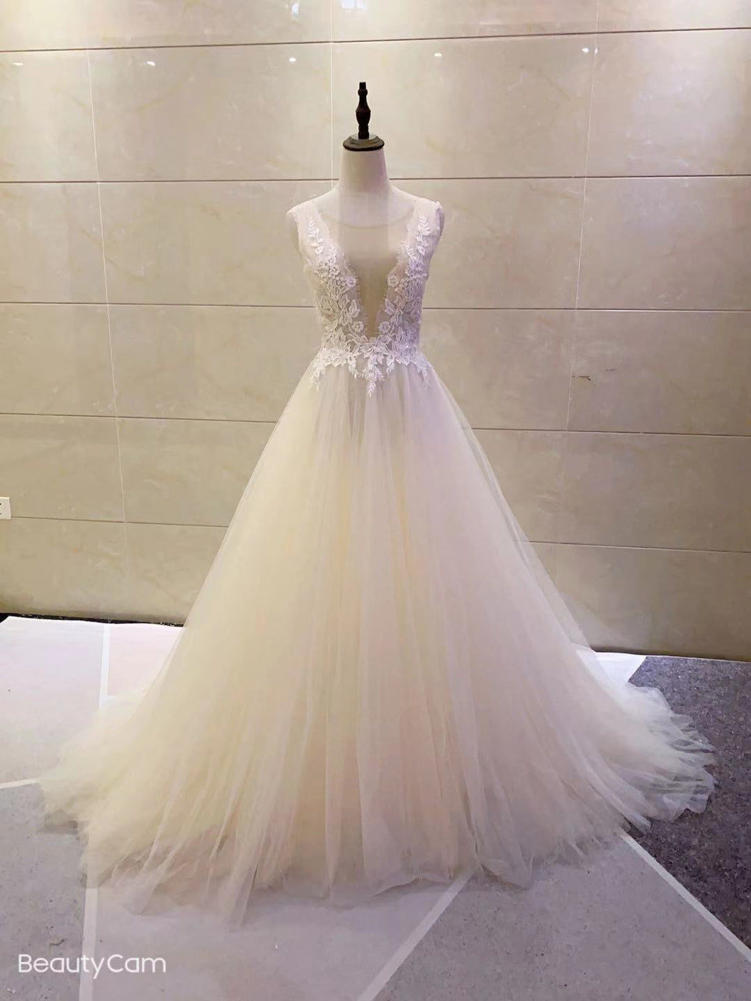 Sleeveless a-line wedding gown