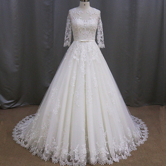 Style 2018 - 3/4 Sleeve Lace Wedding Gown with illusion neckline